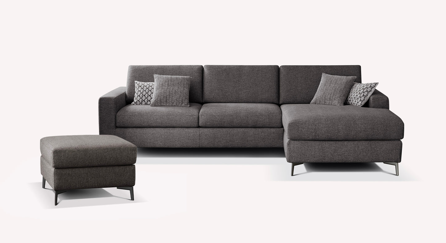 Canapé d'angle anthracite Lisbona avec pouf assorti et coussins décoratifs, design moderne et élégant