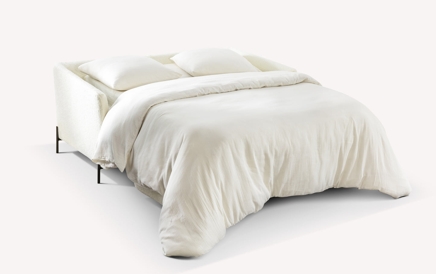 Canapé convertible ouvert en tissu bouclette ivoire, modèle Sogno, avec literie blanche