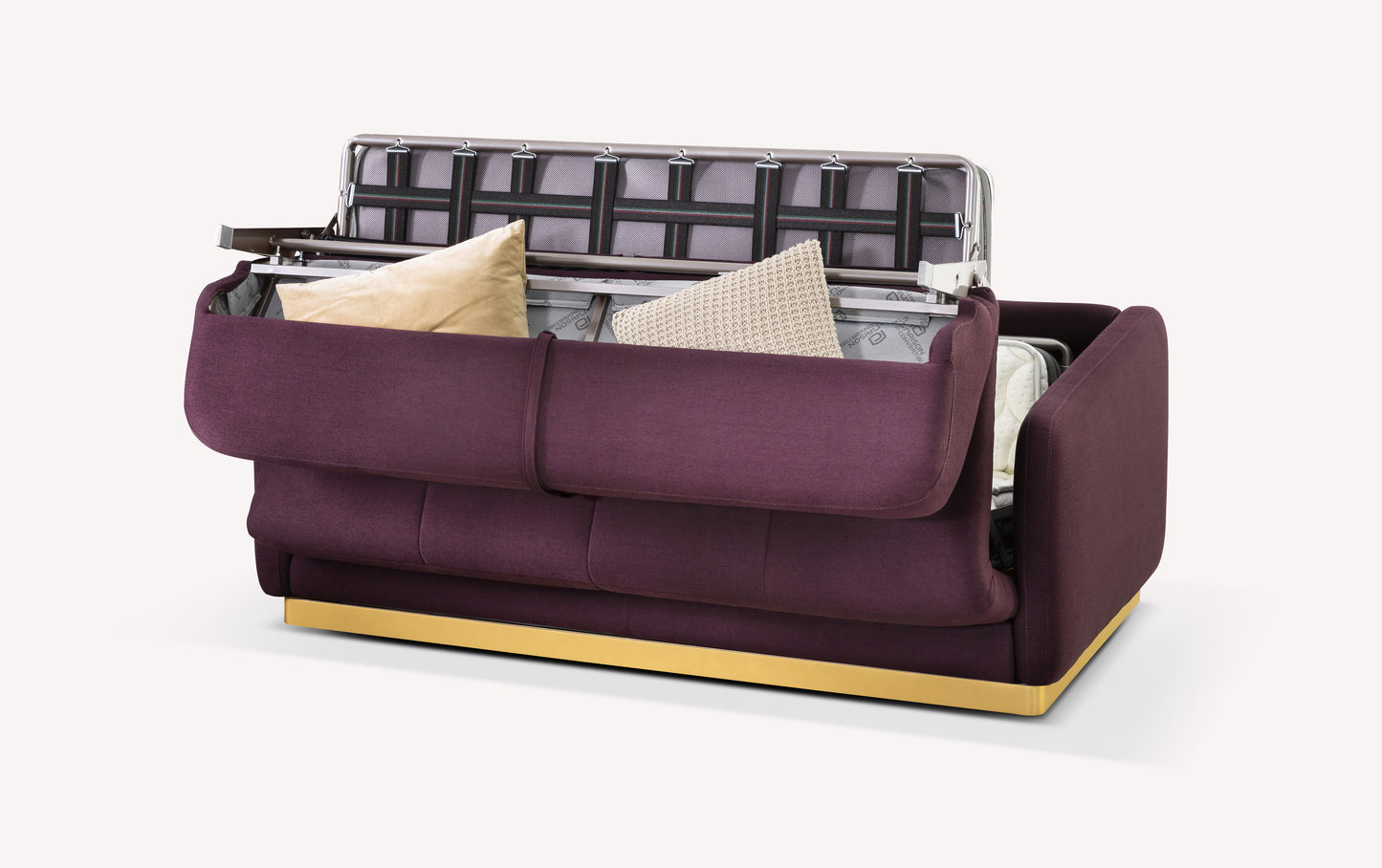 Canapé convertible en tissu violet avec rangement ouvert, montrant des coussins et une structure métallique