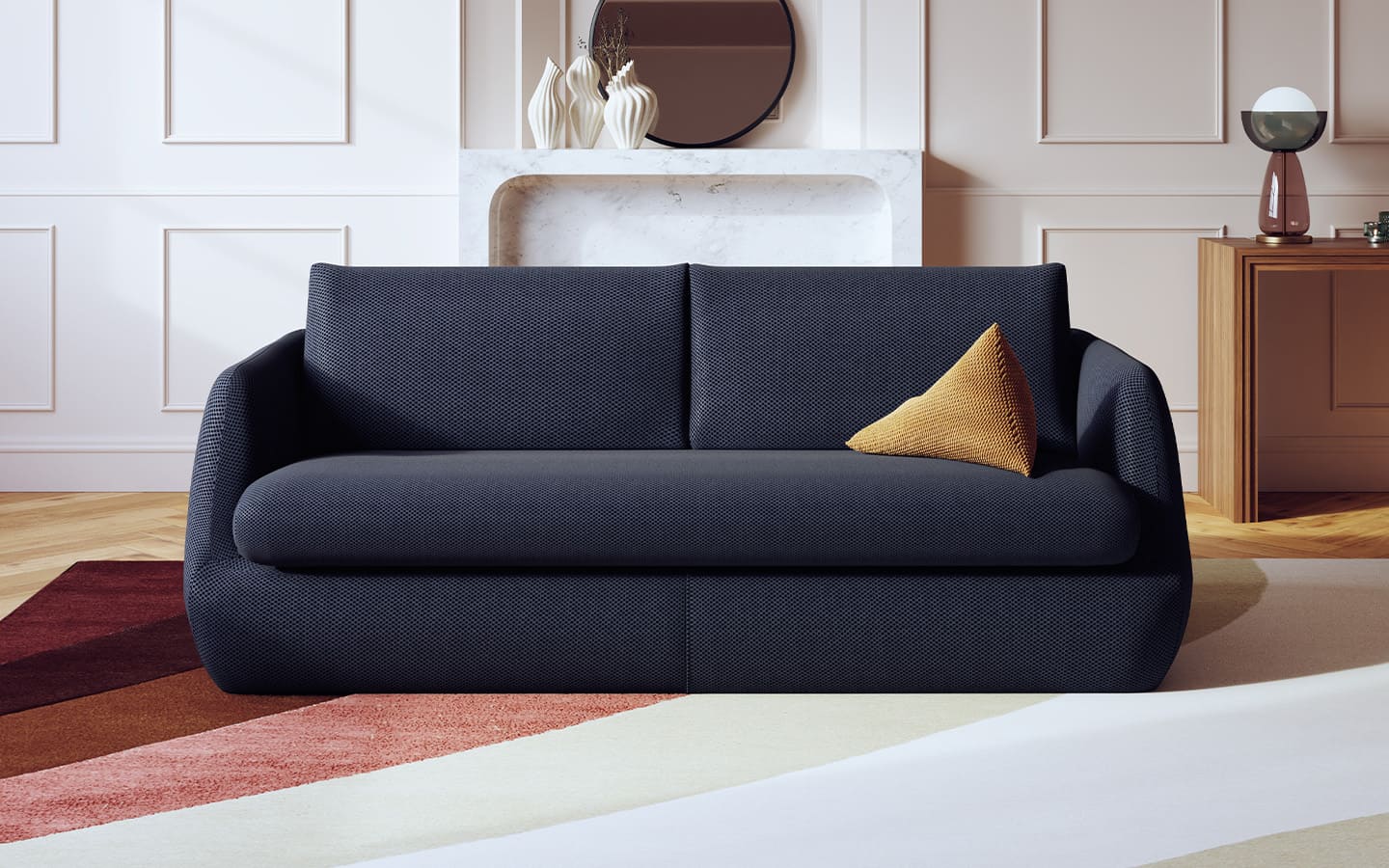 Canapé convertible bleu marine "Vulcano" avec coussin jaune, dans un salon lumineux au style moderne et épuré
