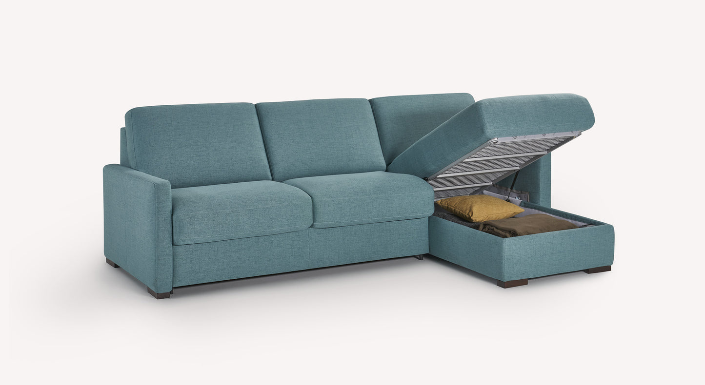 Canapé d'angle turquoise avec rangement intégré ouvert, contenant des coussins. Design moderne et fonctionnel