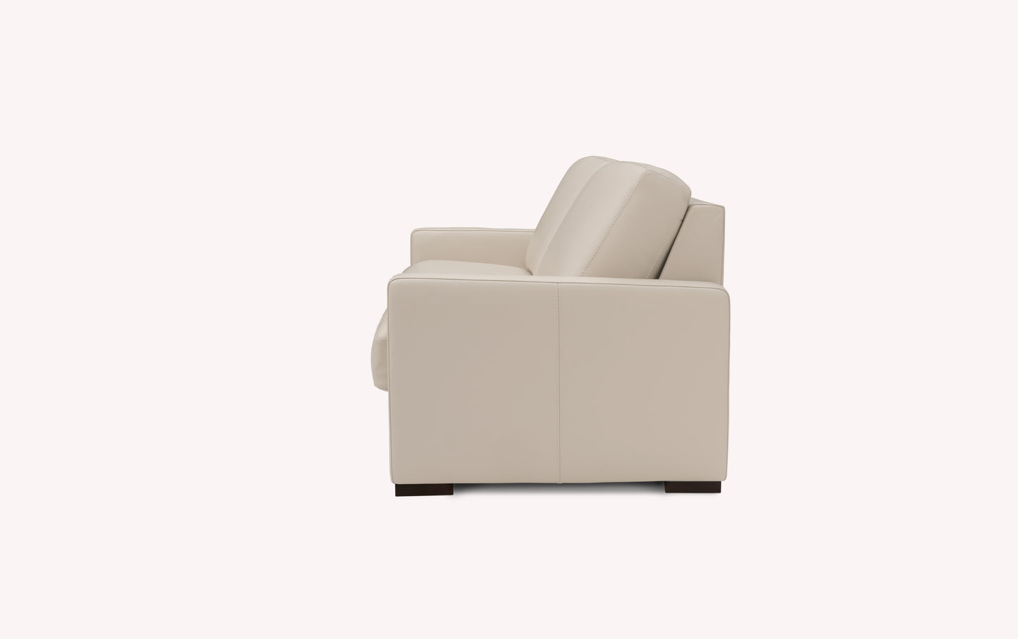 Canapé convertible en cuir luxueux couleur avoine, vue latérale, modèle Lyon