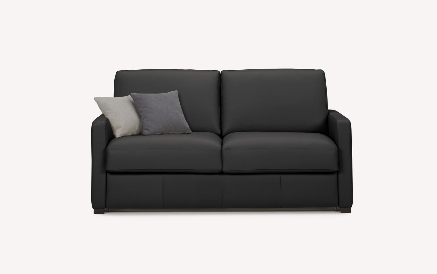 Canapé convertible en cuir noir avec deux coussins gris, style luxueux