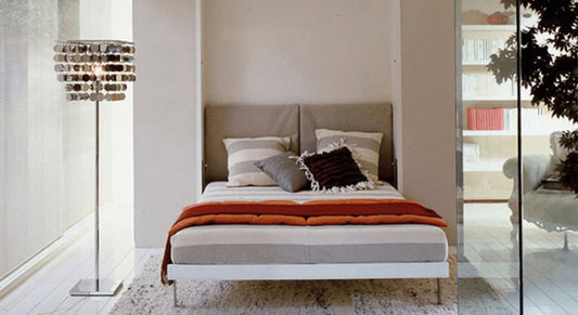 Doit-on fixer un lit escamotable au mur ?