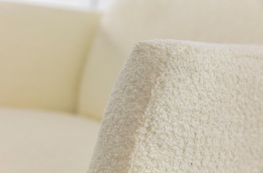Tissu bouclette : le revêtement tendance pour vos meubles