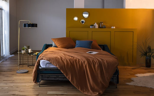 Optimiser votre chambre d'ami : avantages et agencement avec un canapé-lit