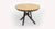 Table ronde relevable Helios avec plateau en bois clair et pieds croisés noirs