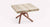Table basse carrée avec plateau en mélaminé imitation bois clair et piètement métallique beige, design moderne et compact LEVANTE Mélaminé Nodato.