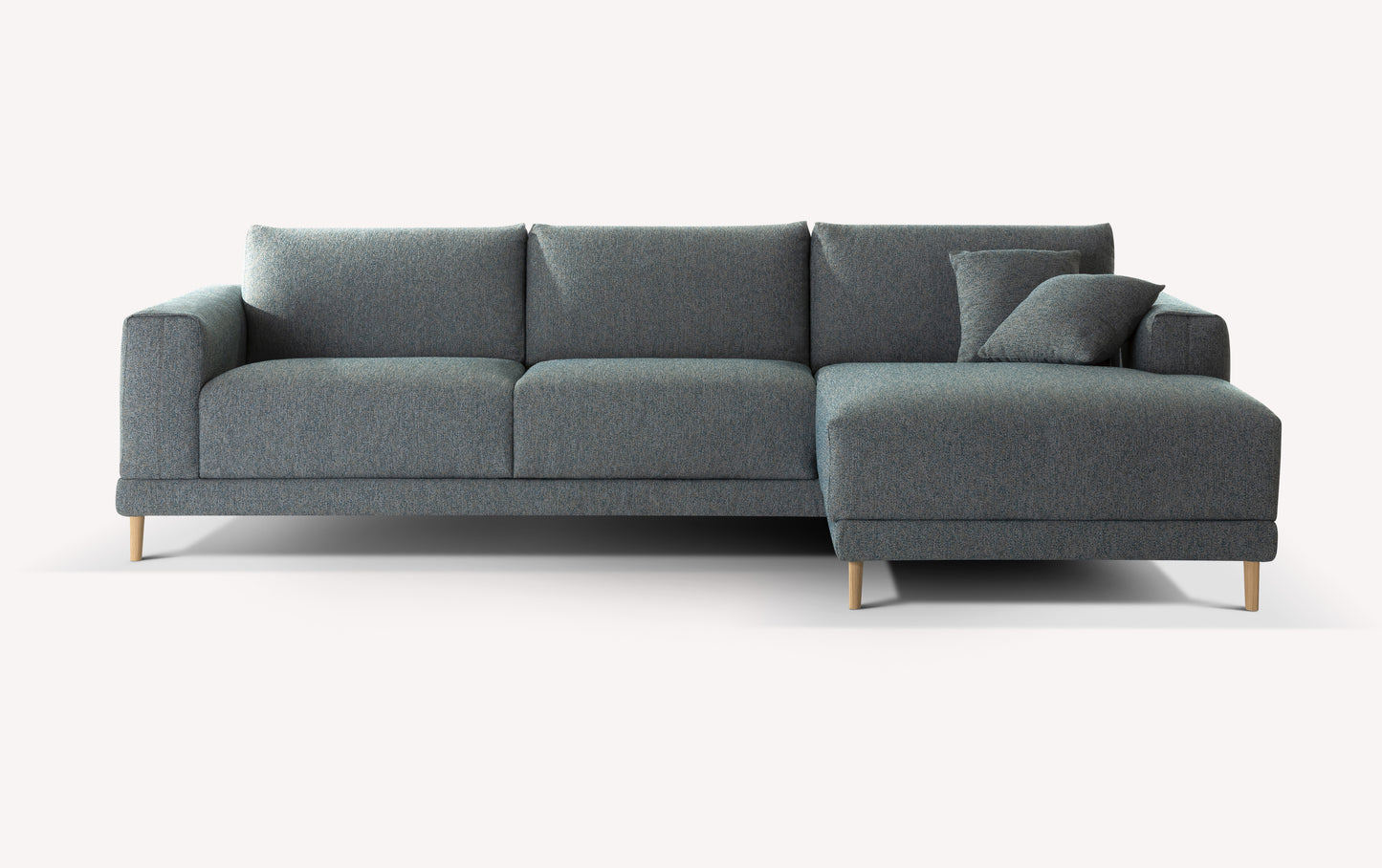 Canapé d'angle fermé en tissu gris avec pieds en bois, coussin assorti, design moderne et épuré