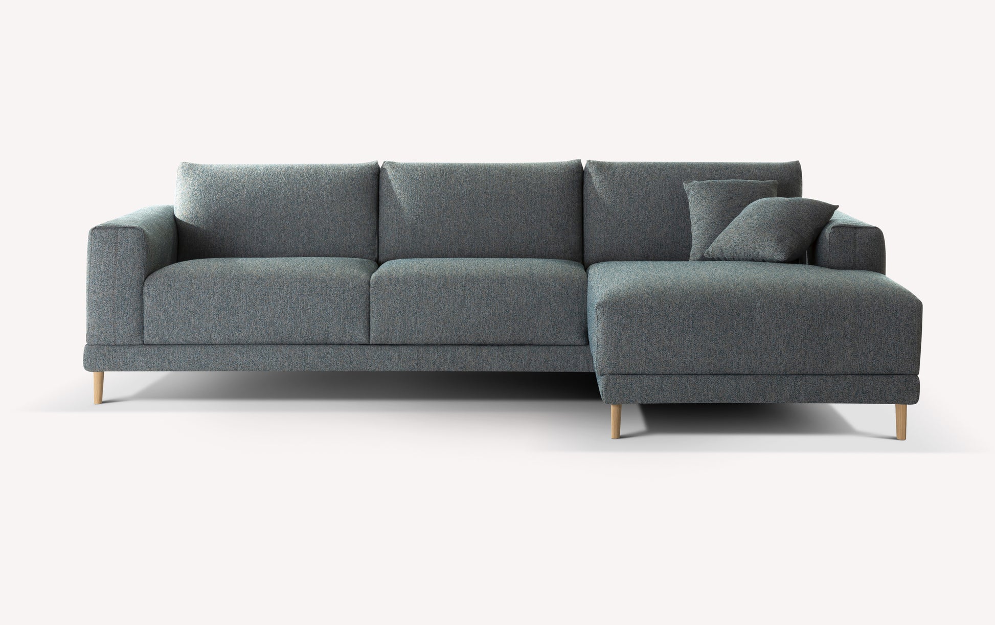 Canapé d'angle fermé en tissu gris avec pieds en bois, coussin assorti, design moderne et épuré