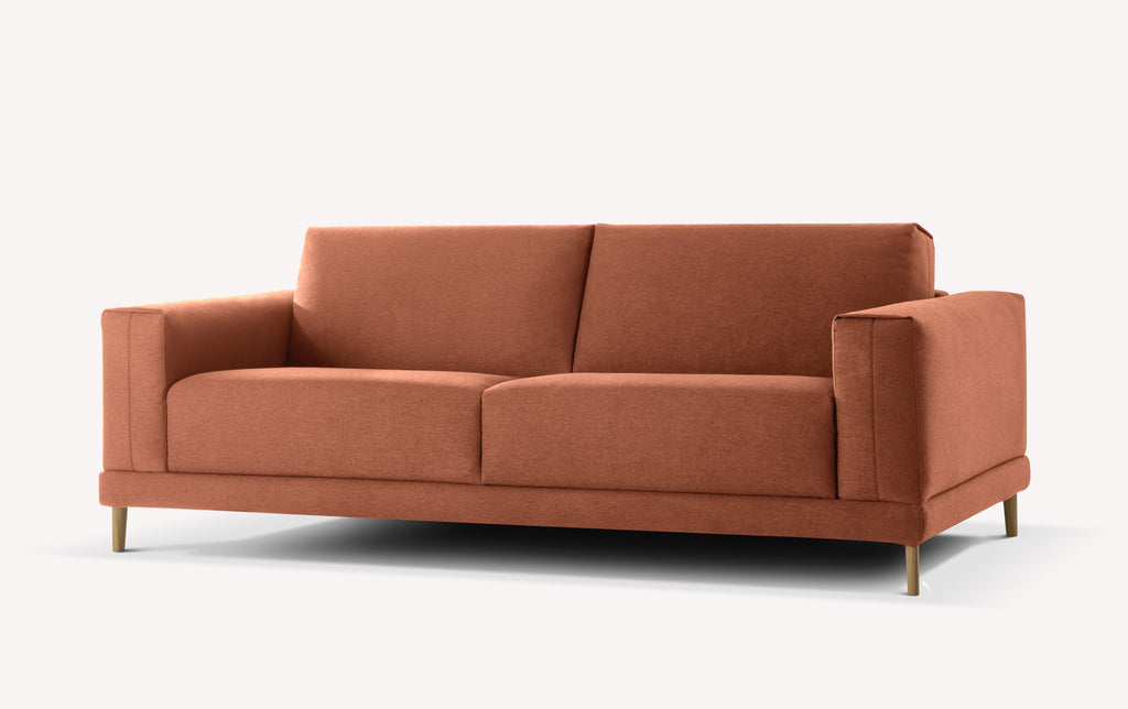 Canapé en tissu Nuvole litchi, design moderne avec accoudoirs épais et pieds en bois, modèle Baker Fermé
