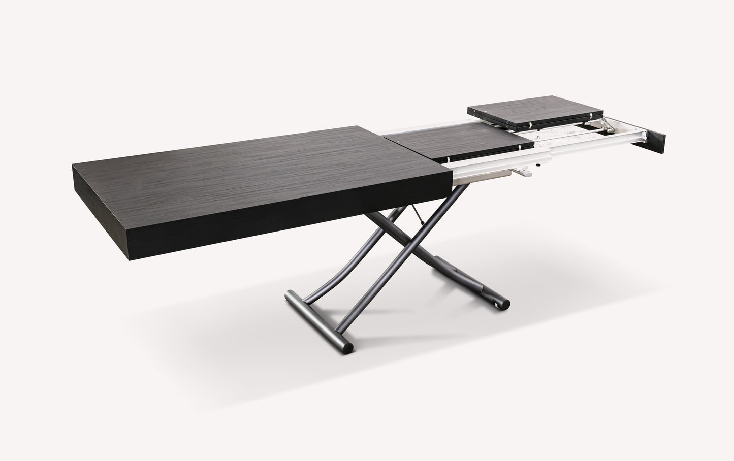 Table extensible en bois foncé avec pieds métalliques croisés, partiellement déployée. Modèle Mélange ML carbone