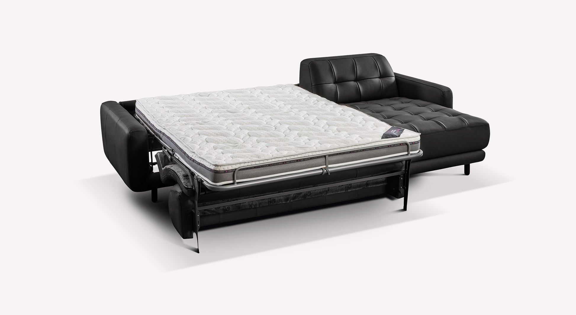 Canapé d'angle convertible Clark en cuir noir Sydney, avec matelas déplié