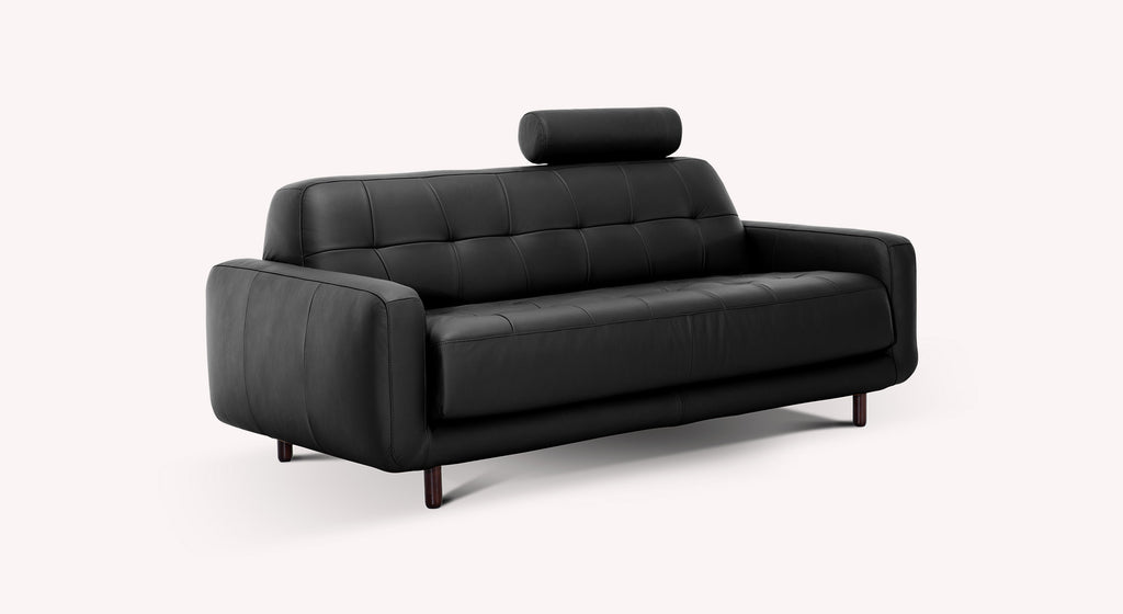 Canapé convertible en cuir noir, modèle Clark Sydney, avec appuie-tête cylindrique et pieds en bois