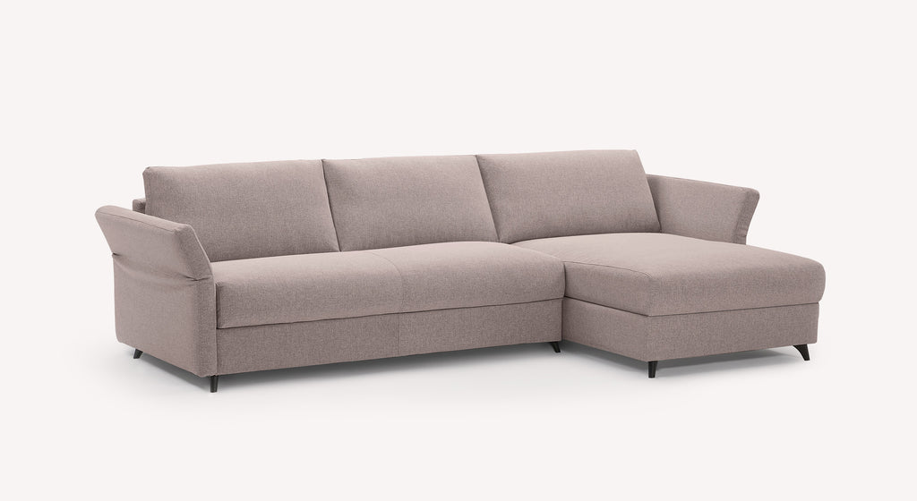 Canapé convertible d'angle en tissu lavande, modèle Donny, avec accoudoirs inclinés et pieds noirs