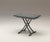 Table extensible moderne SYDNEY Mélaminé Pietra avec plateau effet pierre et piétement en métal noir, design épuré idéal pour optimiser l’espace dans un intérieur contemporain.