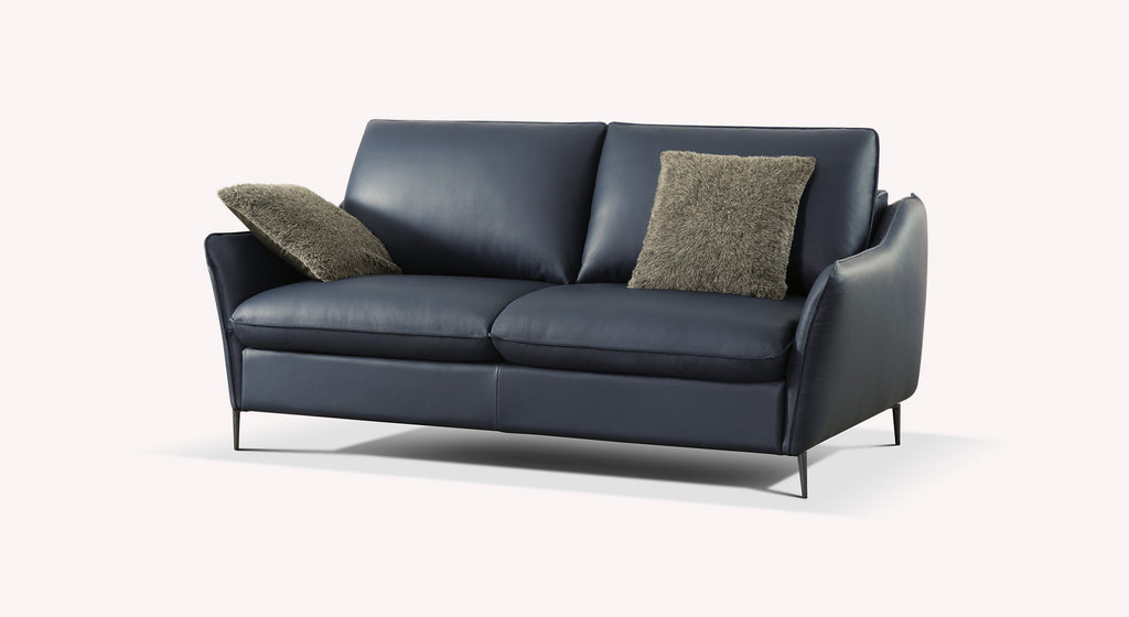 Canapé convertible en cuir bleu royal avec deux coussins gris texturés