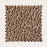 Échantillon de tissu texturé marron, évoquant le luxe et la douceur, avec un motif en relief