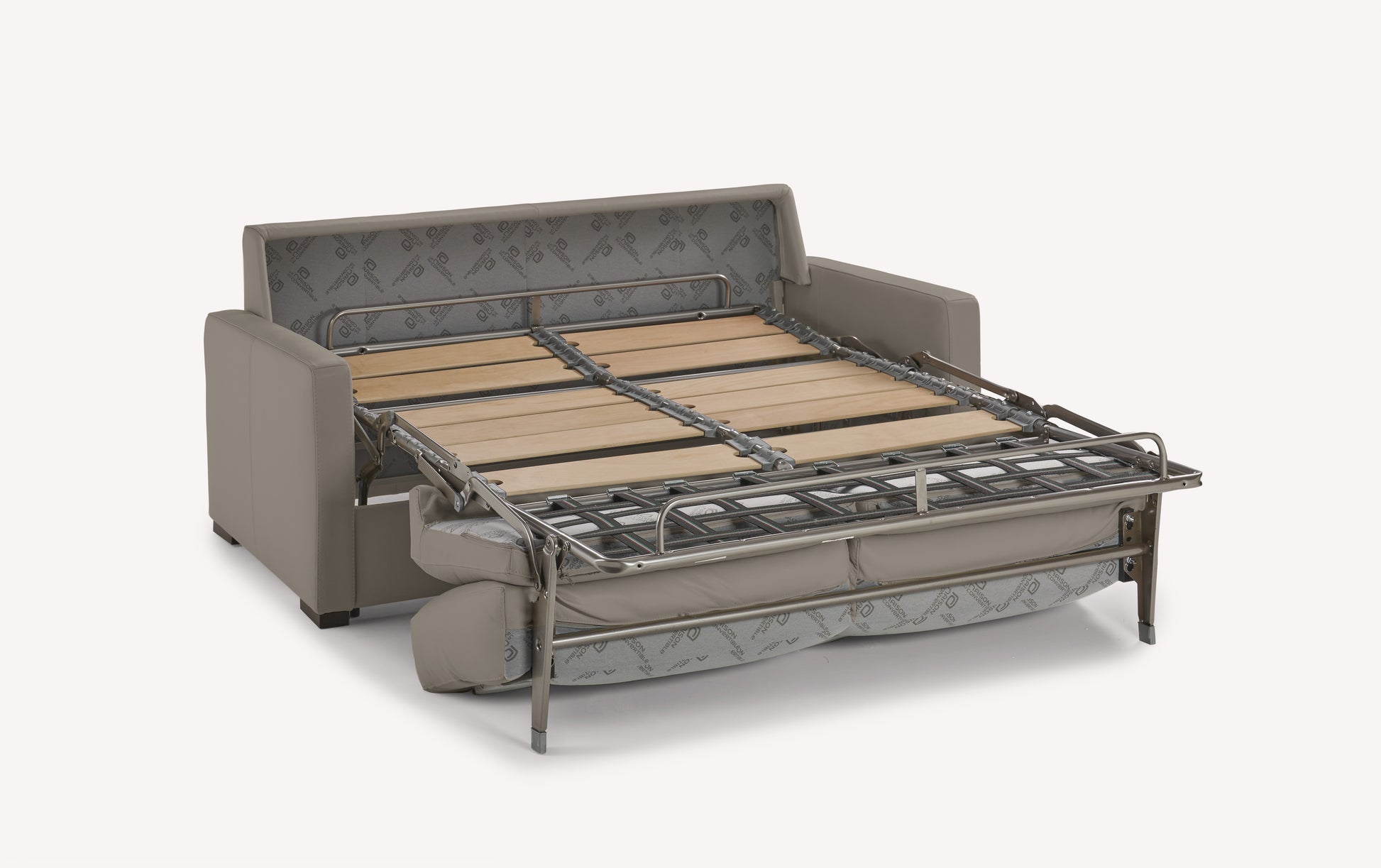 Canapé convertible en cuir gris souris, déplié pour montrer le sommier en bois et métal, modèle luxueux de Lyon