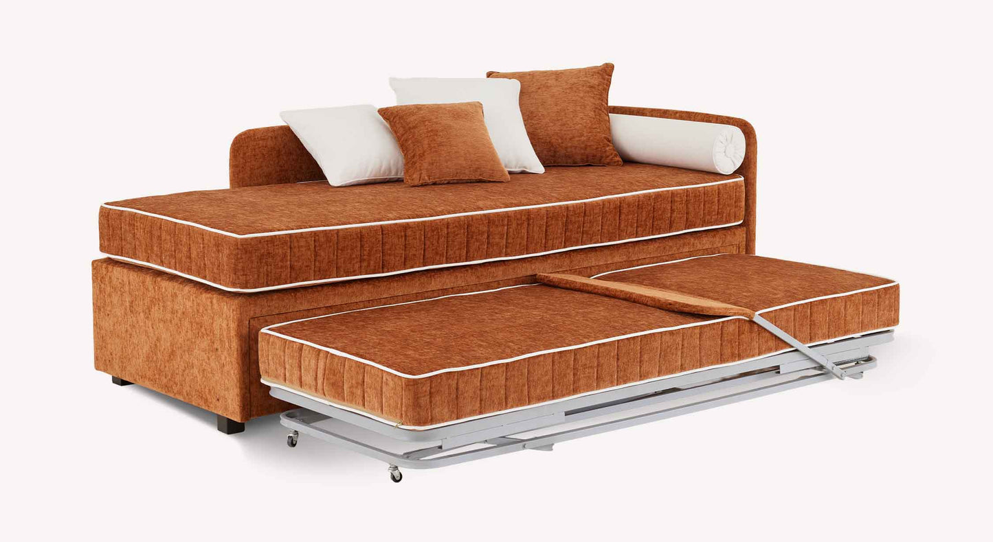 Lit gigogne NOLAN 250 tissus au choix en tissu orange avec coussins blanc et orange, transformable en lit d'appoint pratique pour couchage quotidien.